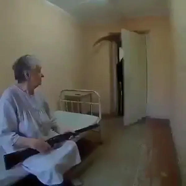 Old Woman Shoots at the Grim Reaper